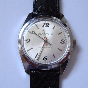 VINTAGE WIND UP CARAVELLE  N8 by BULOVA ,RUN GREAT